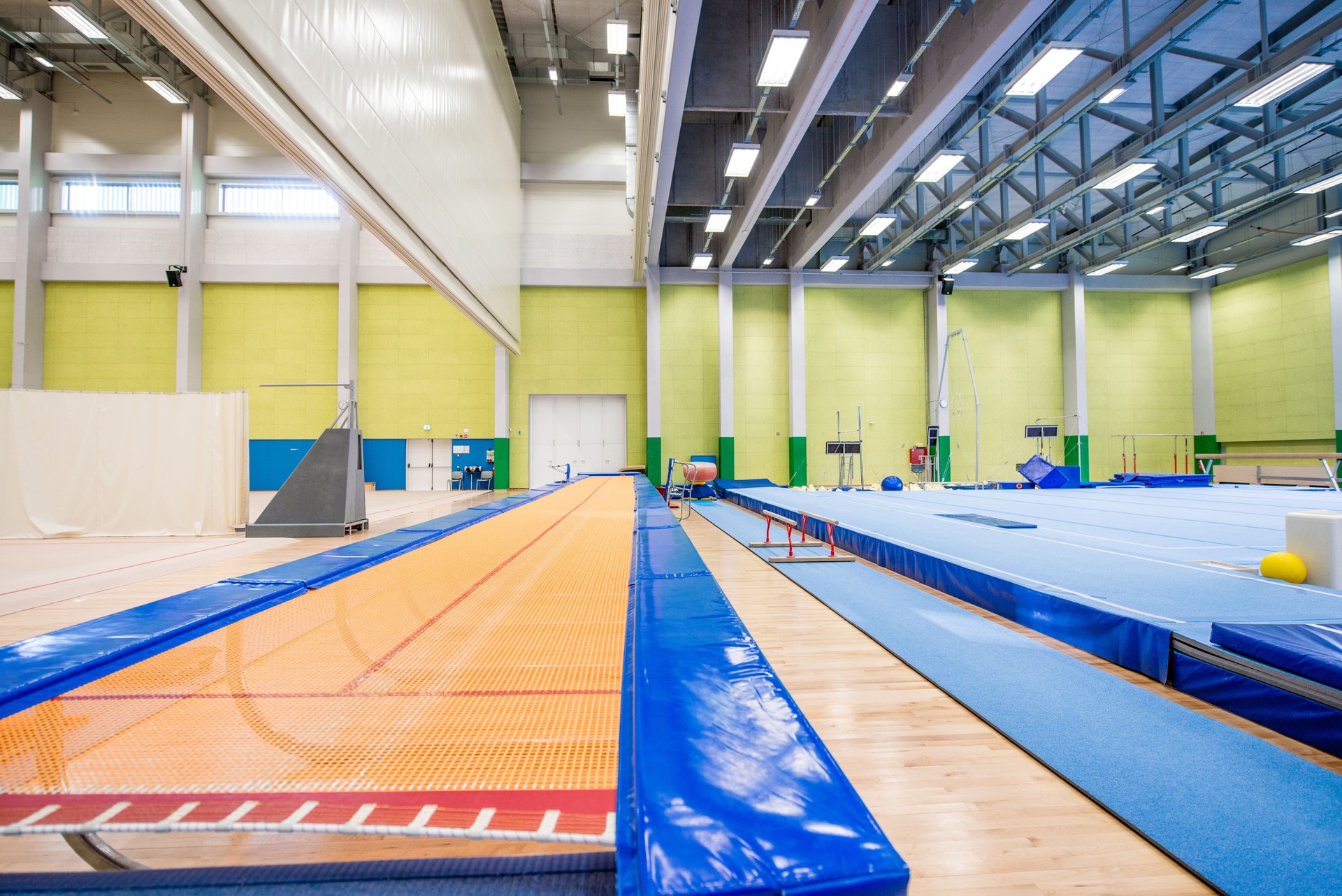 Empty Gym with Long Trampoline and Running Track